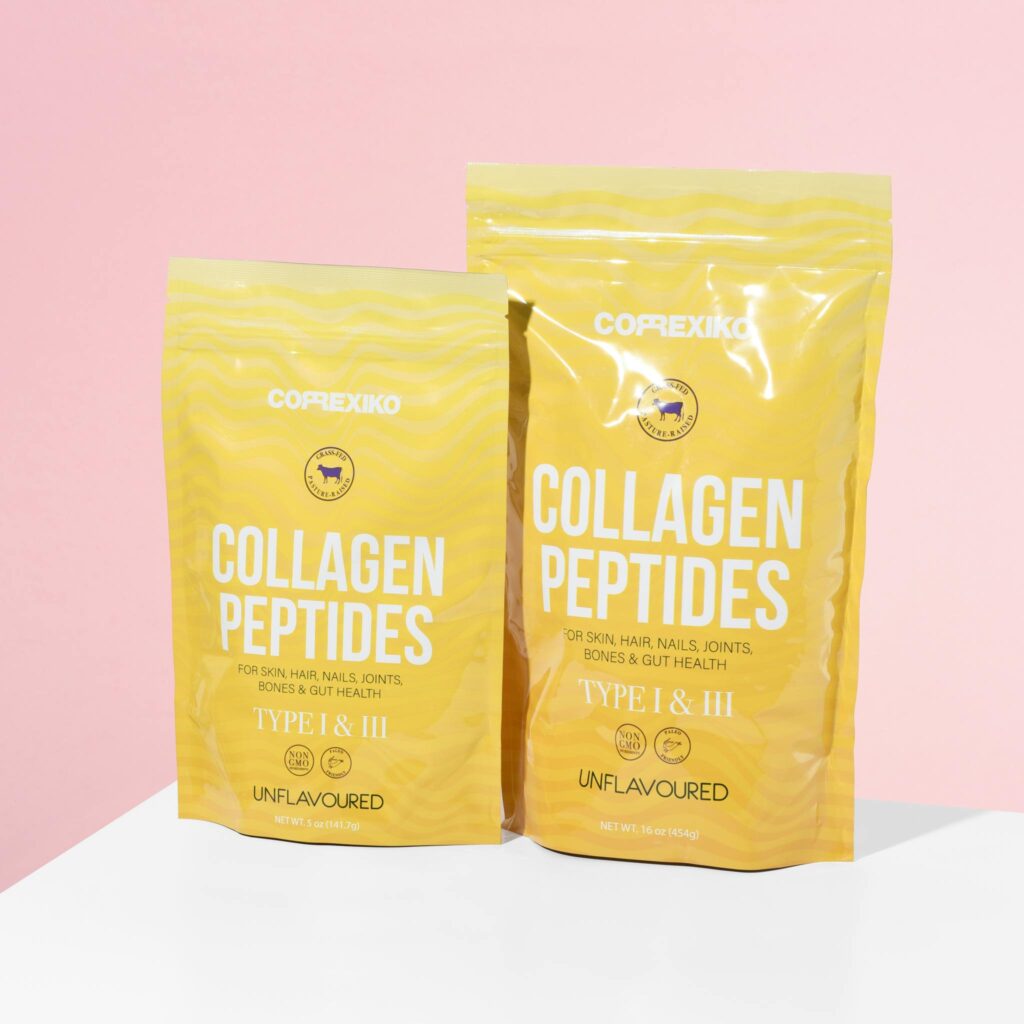 Bright product shot of collagen peptide supplements with pink background.
